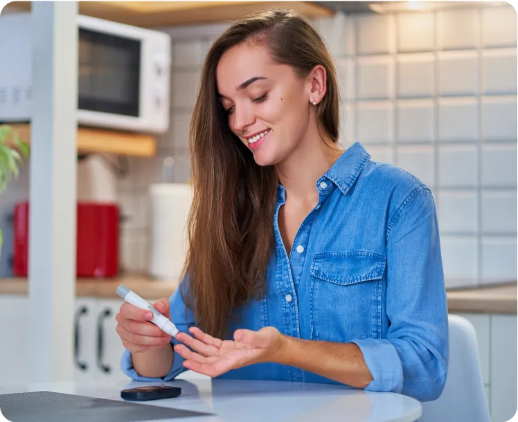 woman pricking her finger